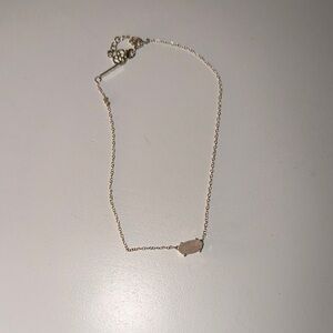 Elegant Gold Necklace with Cream Pendant